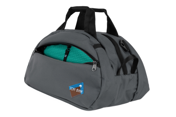 The Old School Carry All in Nebulous 630 Ballistic with Kelpie (blueish-green with white grid) 200 Halcyon interior.